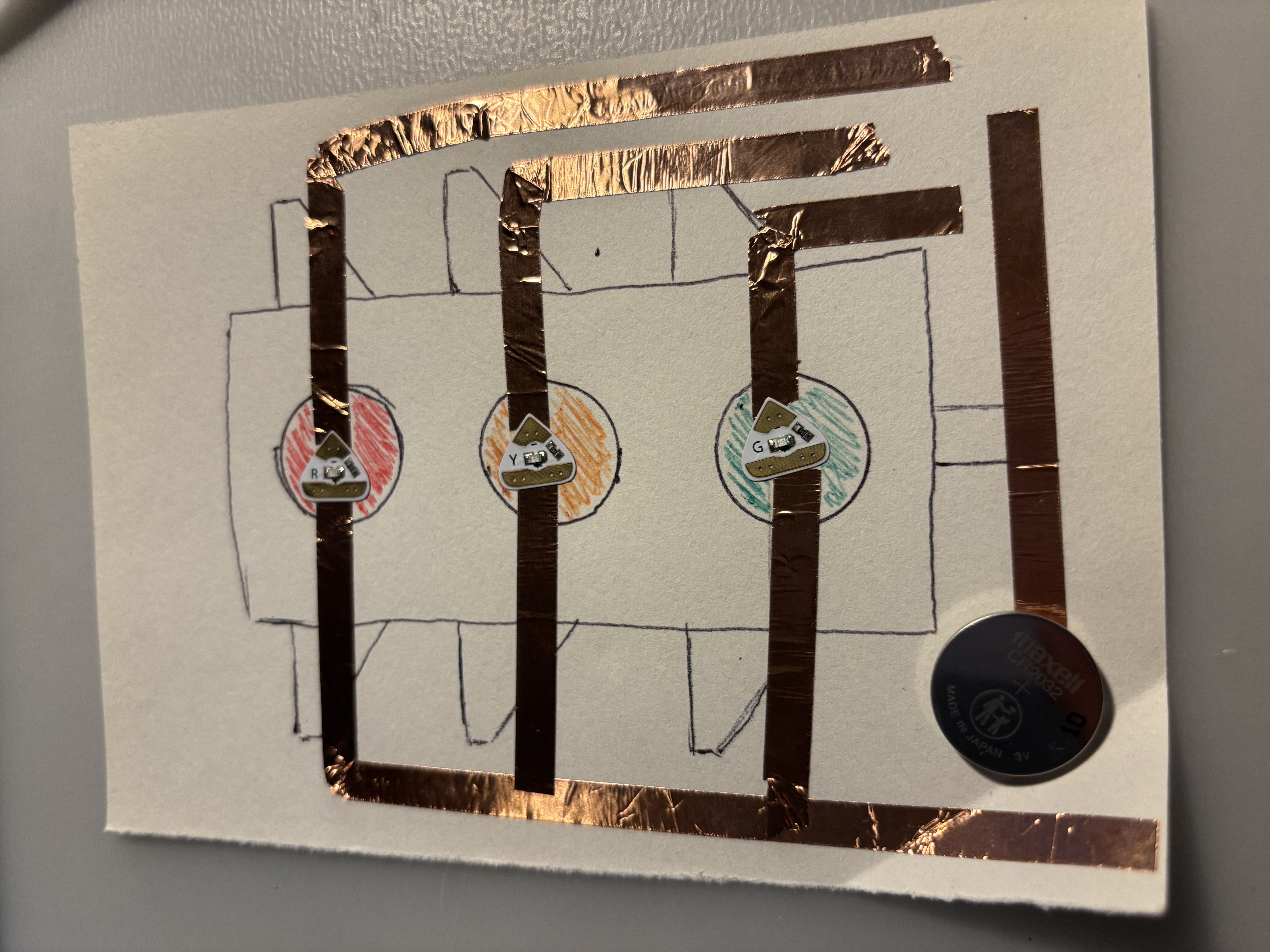 Stop light circuit followed from a tutorial (linked in the pdf).