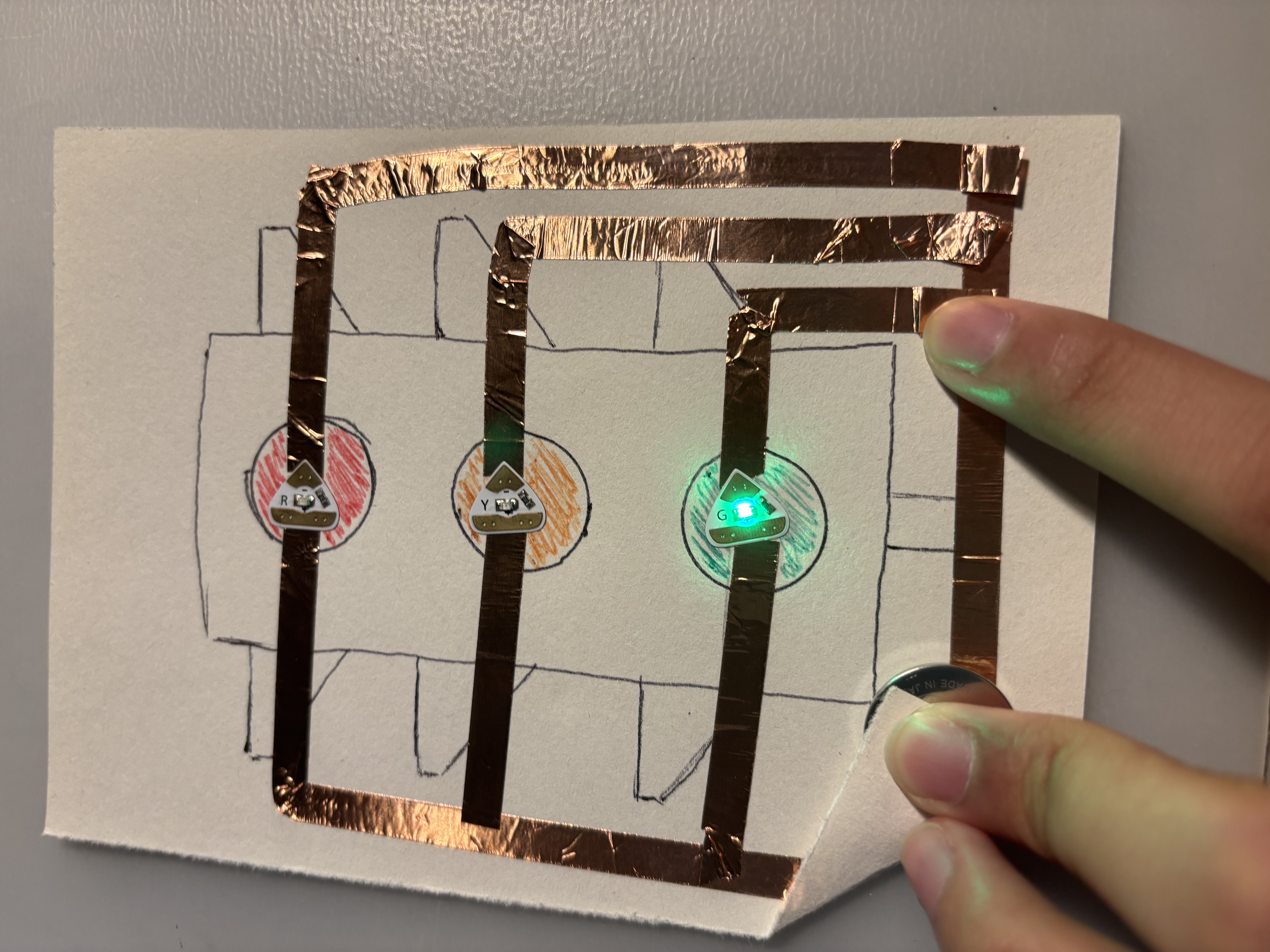 Stop light circuit followed from a tutorial (linked in the pdf).