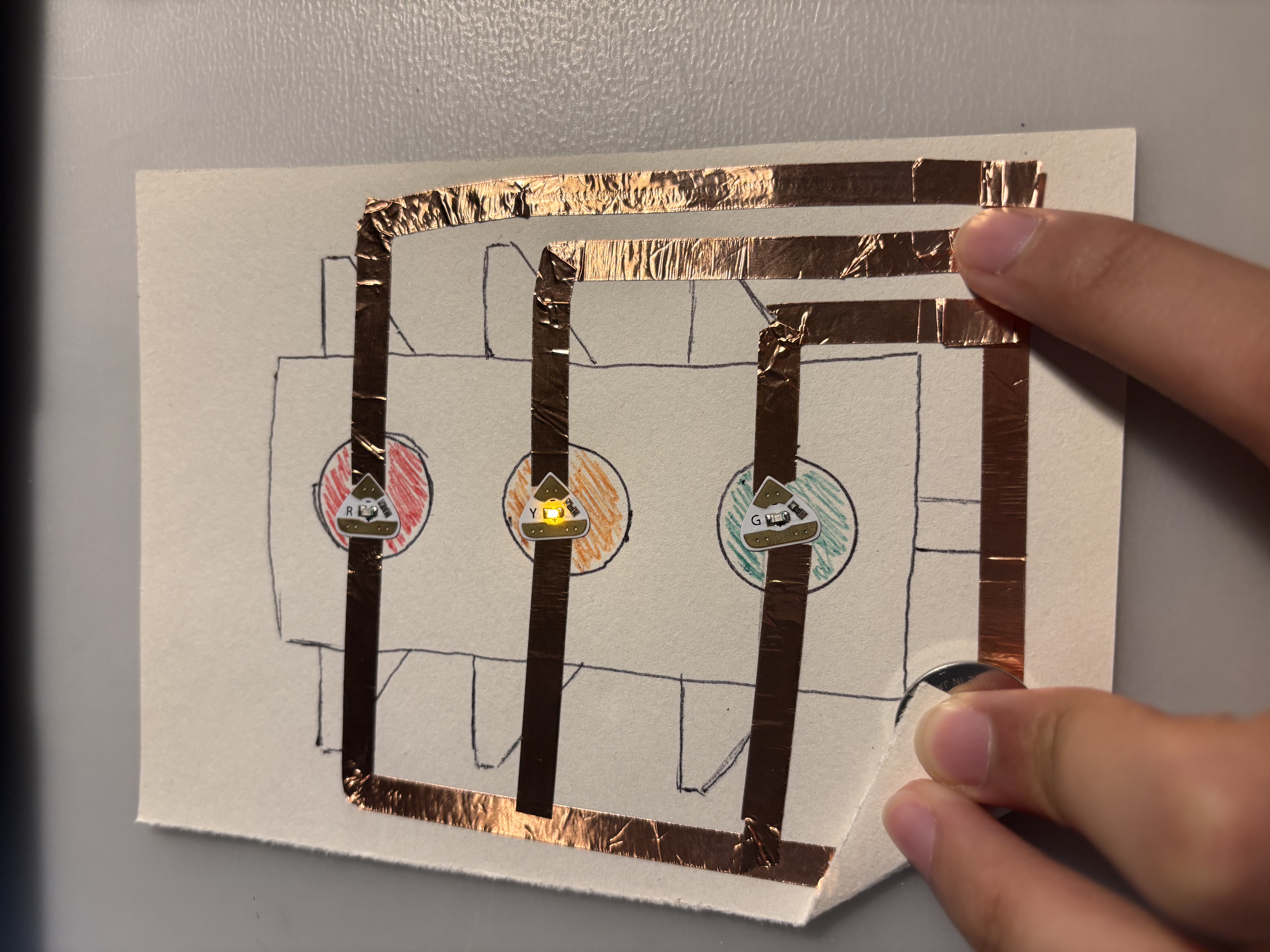 Stop light circuit followed from a tutorial (linked in the pdf).
