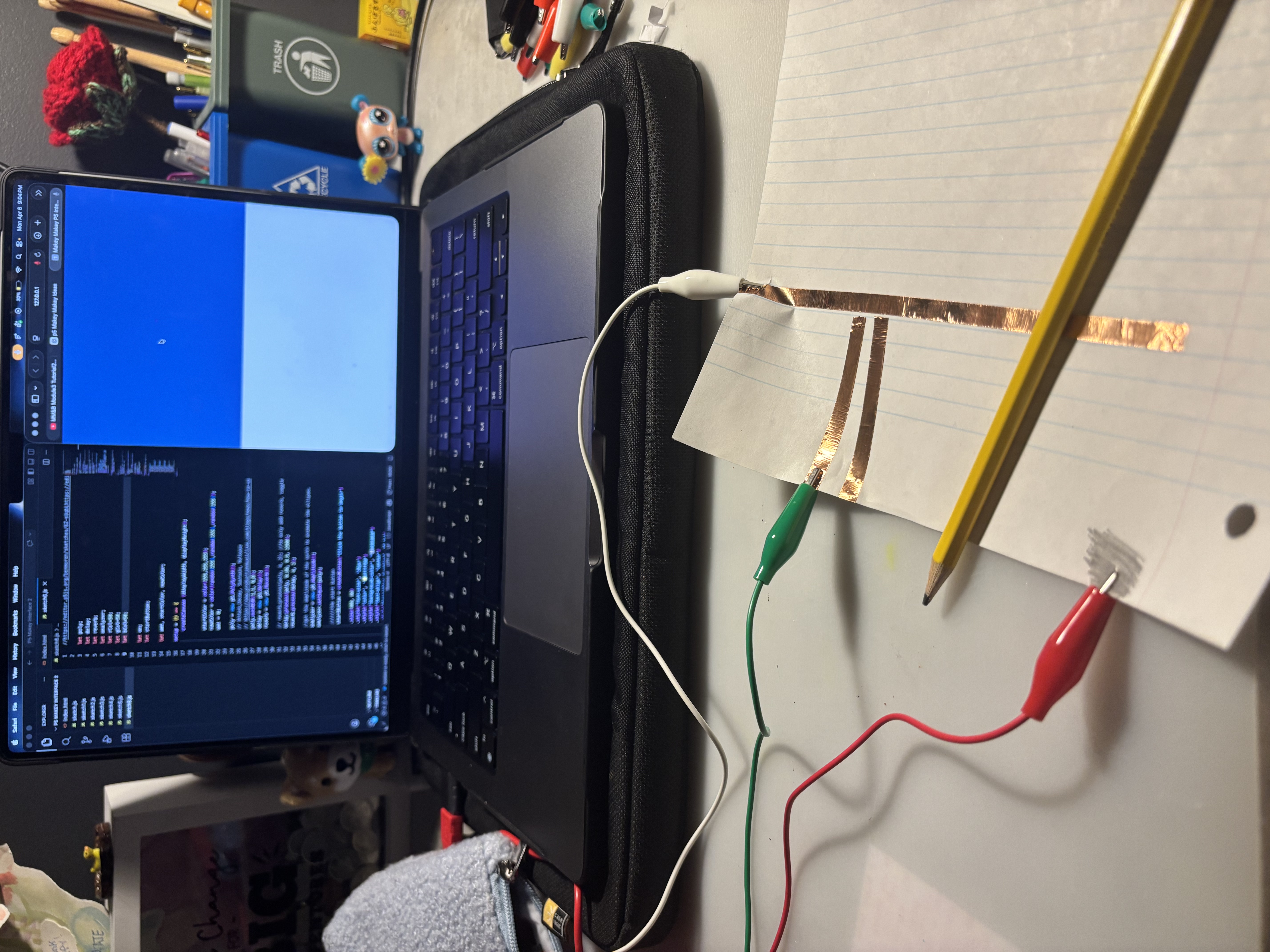 Testing the conductivity of a pencil with the Makey Makey.